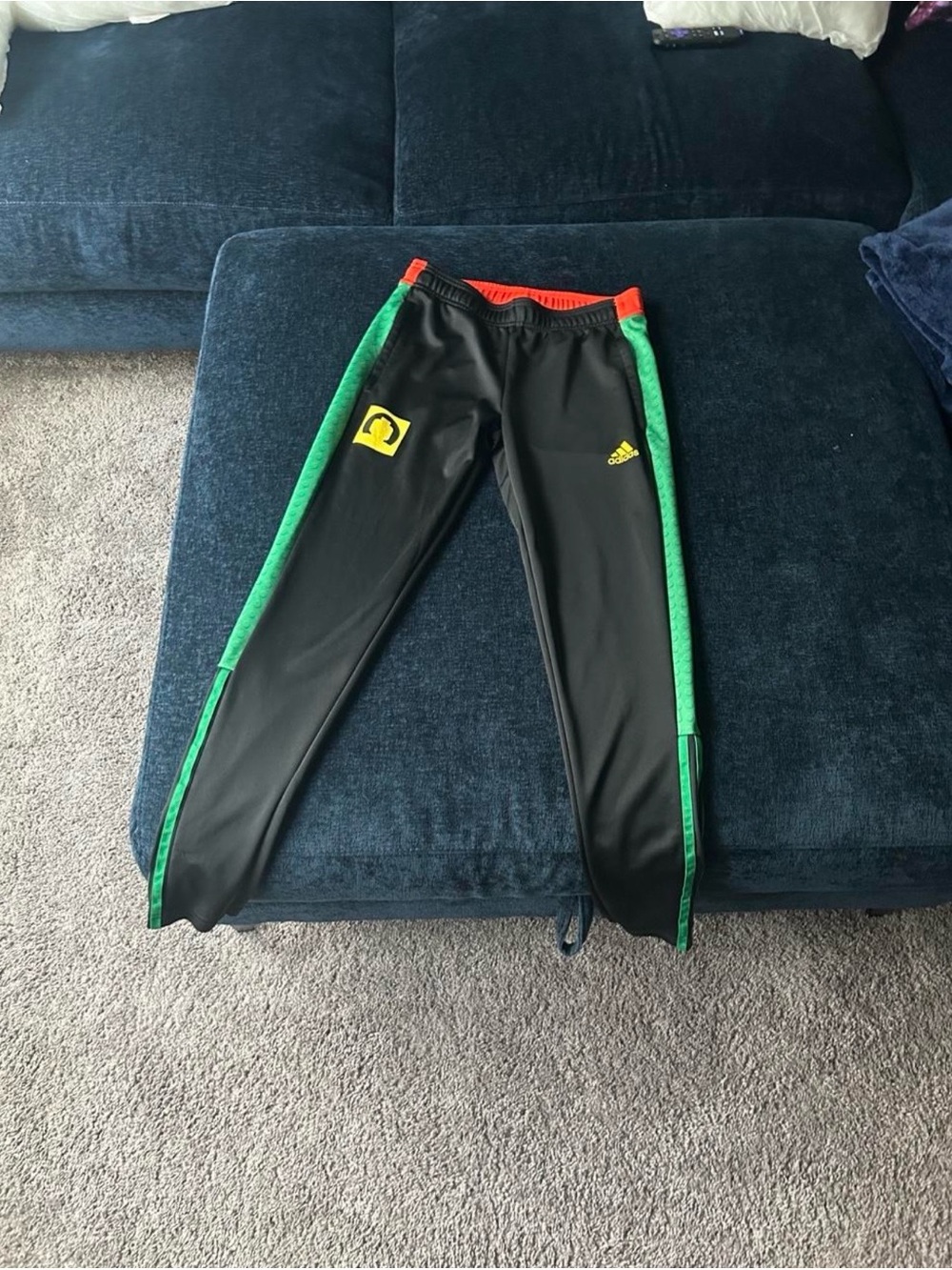adidas Black Sweatpants with Green Side Panels and Orange Waist